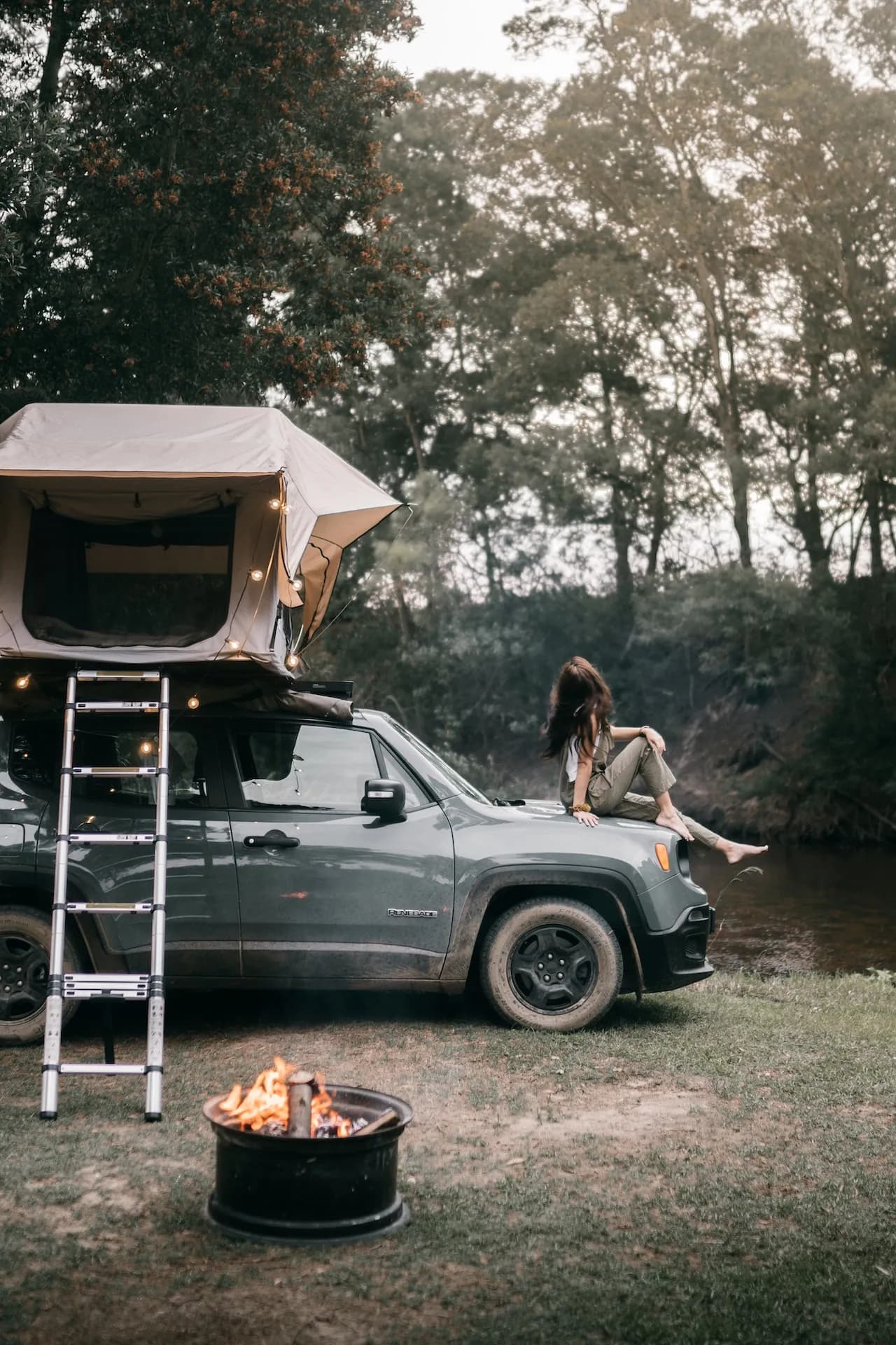 Rooftop tent on an overlanding vehicle at dusk